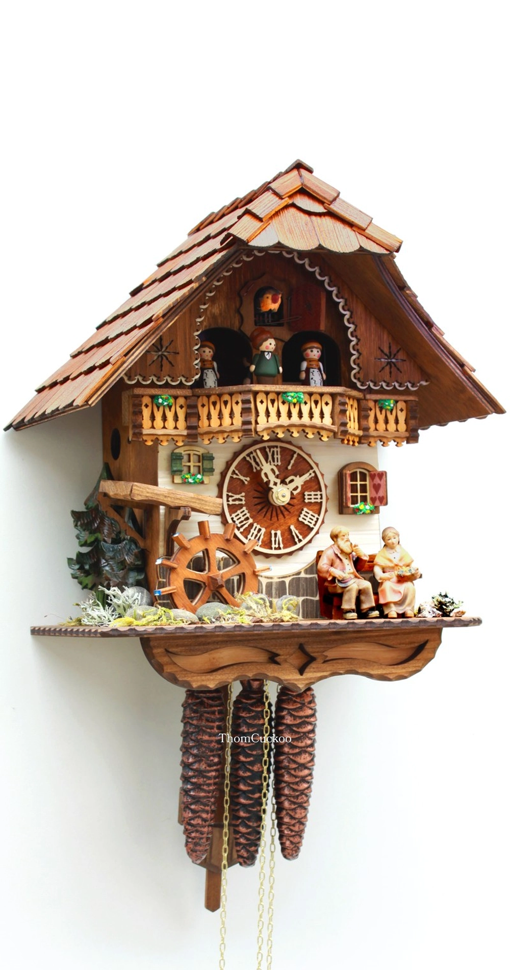 นาฬิกากุ๊กกูเยอรมัน Black Forest Germany ระบบกลไกไขลาน 1 วัน พร้อมเสียงดนตรี บ้านไม้สไตล์ Black Forest กังหันน้ำหมุนได้ รหัสสินค้า 0817
