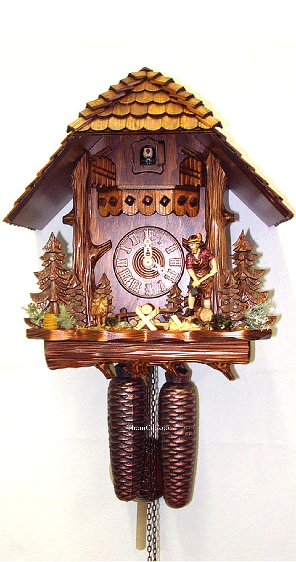 นาฬิกากุ๊กกูเยอรมัน Black Forest Germany ระบบกลไกไขลาน 8 วัน ทรงลำต้นไม้แกะสลัก คนตัดไม้เคลื่อนไหว รหัสสินค้า 0557