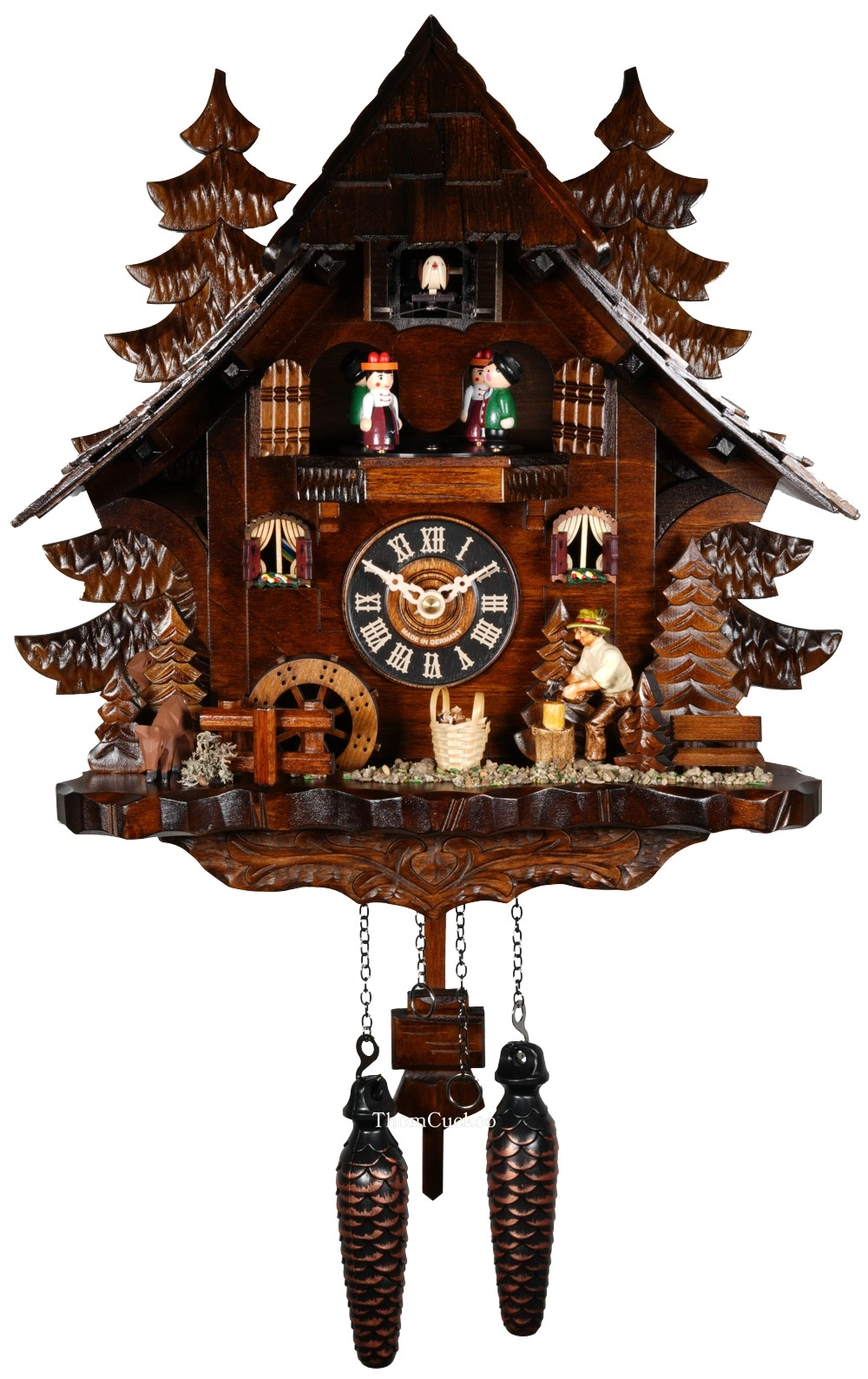 นาฬิกากุ๊กกูเยอรมัน Black Forest Germany ระบบ Quartz พร้อมเสียงดนตรี บ้านไม้สไตล์ Black Forest คนตัดไม้เคลื่อนไหว กังหันน้ำหมุนได้ รหัสสินค้า 0287