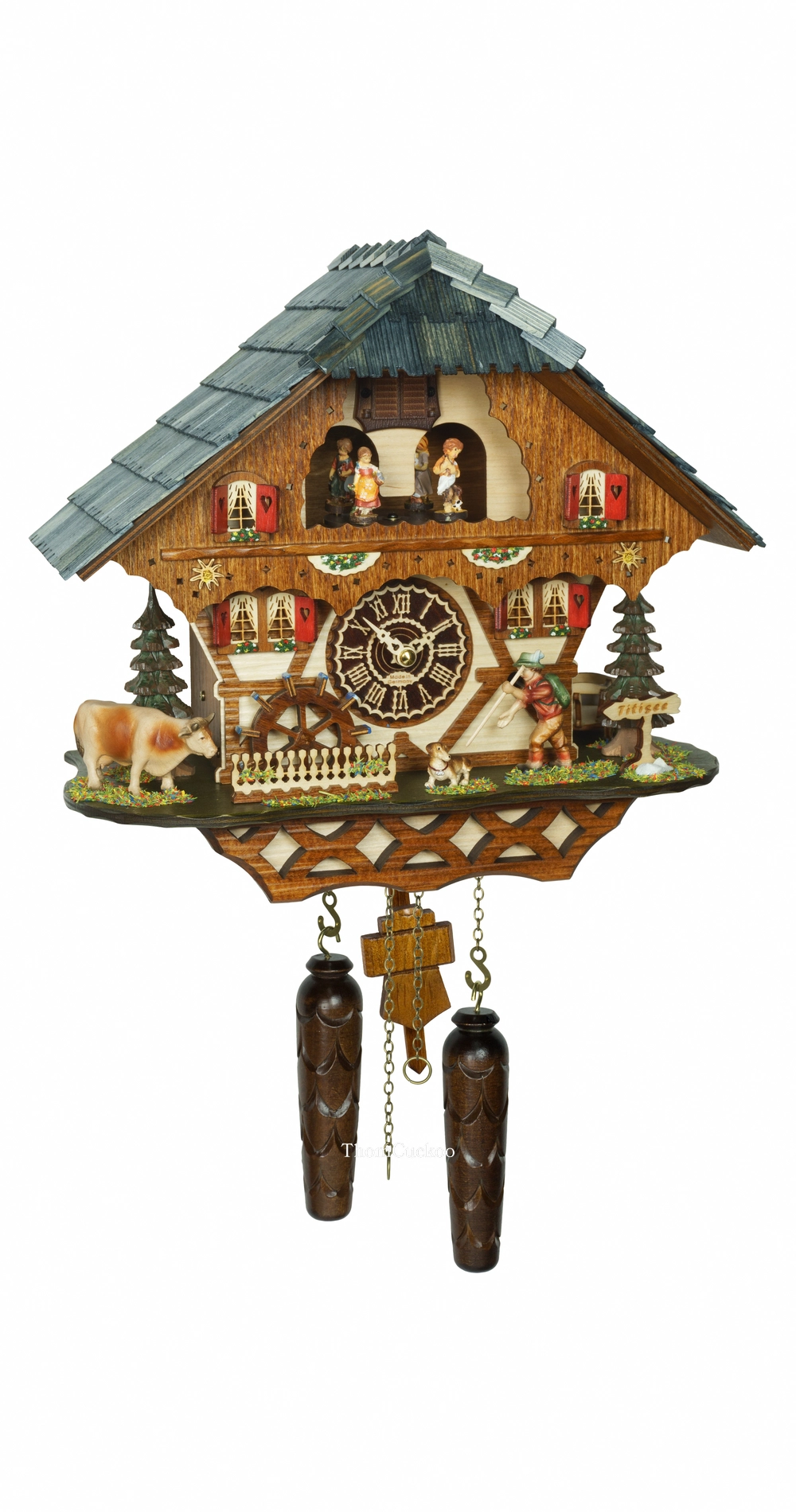 นาฬิกากุ๊กกูเยอรมัน Black Forest Germany ระบบ Quartz พร้อมเสียงดนตรี บ้านไม้สไตล์ Black Forest กังหันน้ำหมุนได้ ตุ๊กตาเต้นระบำ นักเดินป่าเคลื่อนไหว รหัสสินค้า 0293