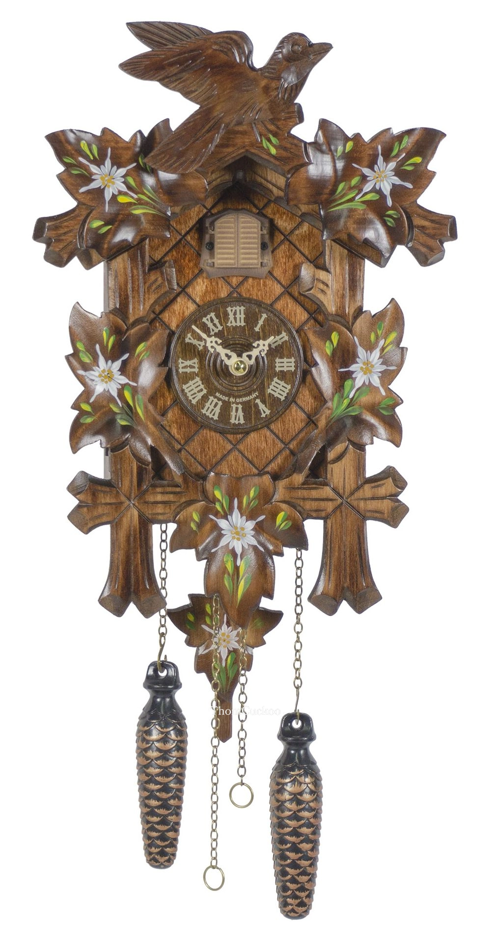 นาฬิกากุ๊กกูเยอรมัน Black Forest Germany ระบบ Quartz พร้อมเสียงดนตรี ลายใบไม้และนกแกะสลัก รหัสสินค้า 0039